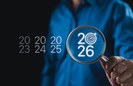 The 2026 New Year business goals concept. Magnifying glass focus year 2026 with a target icon,...