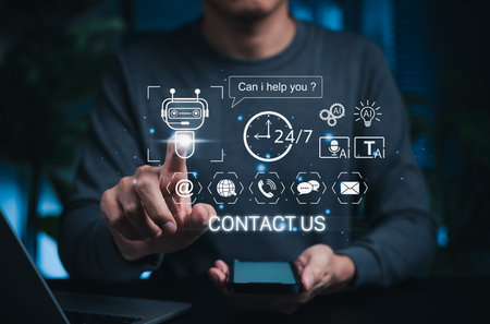 AI chatbot customer service concept. Person using smartphone with virtual assistant icon surrounded...