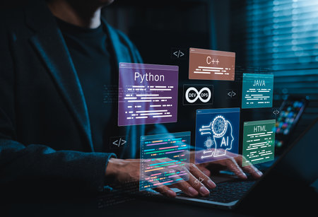 Programming and software development concept. Developer working with code including Python, Java,...