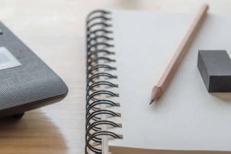 Calculator, notebook and pencil for calculateの写真素材