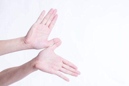 Hand gestures such as flying birds on a white background.の写真素材