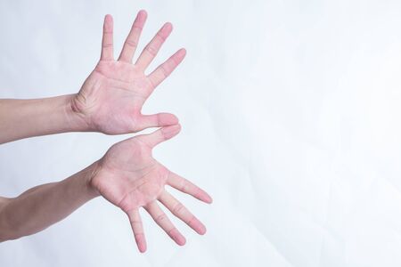 Hand gestures such as flying birds on a white background.の写真素材
