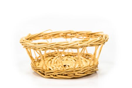 Basket made of wood placed on a white background.の写真素材