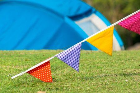 The flag is a symbol of our tent to bundle with wind direction.の写真素材