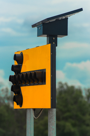 Yellow rifle symbolizes the curve of the road in Thailand.の写真素材