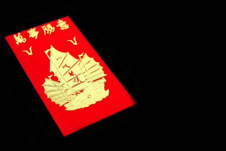 Chinese red pocket on black backgroundの写真素材