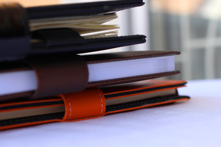 A pile of note booksの写真素材