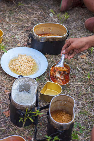 Camping and cooking food on vacation of children in rural areas.