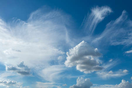 Blue sky with white clouds, (Cirrocumulus clouds)  in blue sky on sunny peaceful day.