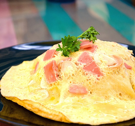 Bacon and sausage omelet の写真素材