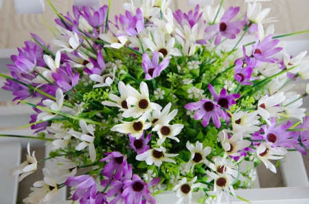 Close up Artificial flowers pots in gardenの写真素材