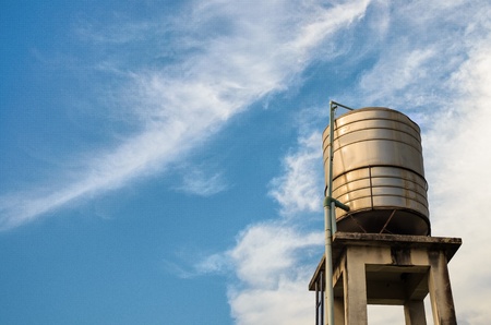 water tank with blue sky backgroundの写真素材