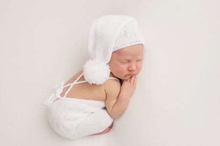 Sleeping newborn baby. Healthy and medical concept. Healthy child, concept of hospital and happy motherhood. Infant baby. Happy pregnancy and childbirth. Children's theme. Baby and childen's goods.の写真素材