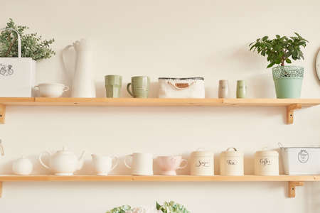 bright kitchen in the style of Provence, on the table dishes and a bouquet of flowers in a vase