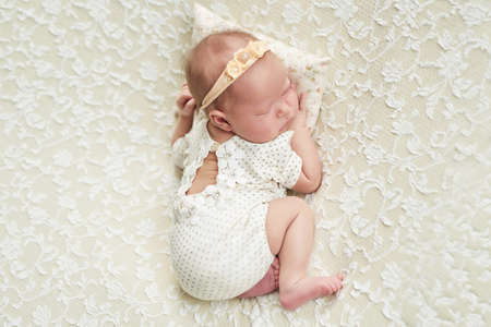 Sleeping newborn baby. Healthy and medical concept. Healthy child, concept of hospital and happy motherhood.の写真素材