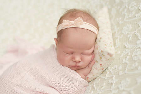 Sleeping newborn baby. Healthy and medical concept. Healthy child, concept of hospital and happy motherhood.の写真素材
