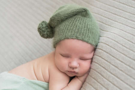 Sleeping newborn baby. Healthy and medical concept. Healthy child, concept of hospital and happy motherhood. Infant baby. Happy pregnancy and childbirth. Children's theme. Baby and childen's goodsの写真素材
