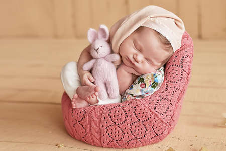 Sleeping newborn baby. Healthy and medical concept. Healthy child, concept of hospital and happy motherhood. Infant baby. Happy pregnancy and childbirth. Children's theme. Baby and childen's goods.の写真素材