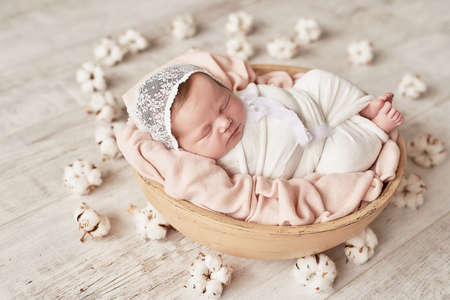 Sleeping newborn baby. Healthy and medical concept. Healthy child, concept of hospital and happy motherhood. Infant baby. Happy pregnancy and childbirth. Children's theme. Baby and childen's goods.の写真素材