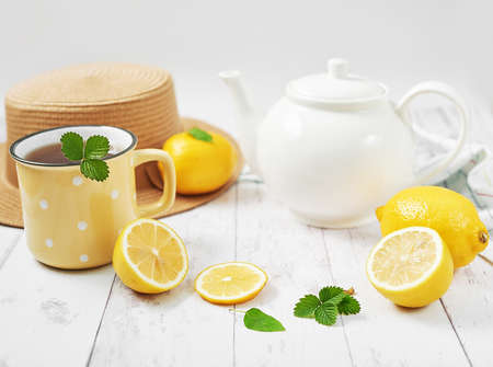 Tea with lemon. Cup of tea. Cozy morning. Healthy breakfast. Good morning. Health prevention. Vitamins. Citruses colds, copy space. Aromatherapy. Food mood. Food and drink, still life health careの写真素材
