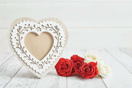 Valentine day romantic background with red roses flowers and frame. Happy Valentine's day greeting...