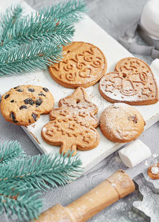 Ingredients for cooking Christmas baking. Christmas gingerbread of various shapes. Festive food, family culinary, Merry Christmas and New Year traditions conceptの写真素材