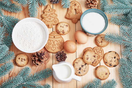 Ingredients for cooking Christmas baking. Christmas gingerbread of various shapes. Festive food,...