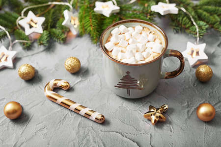 Christmas coffee cup with marshmallows. Merry christmas and new year flat lay. Winter celebrations, vacations and weekends. Christmas food and treats.の写真素材