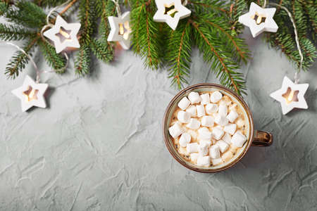 Christmas coffee cup with marshmallows. Merry christmas and new year flat lay. Winter celebrations, vacations and weekends. Christmas food and treats.の写真素材