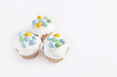 Easter sweet homemade cupcake and eggs. Greeting card. Festive food. Table with treats. Homemade cakes and desserts.の写真素材