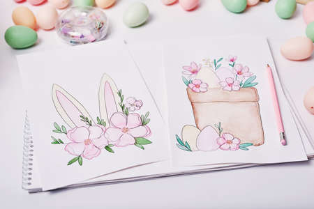 Easter eggs and flowers. Spring greeting card Happy Easter. Easter decor. Watercolor spring...