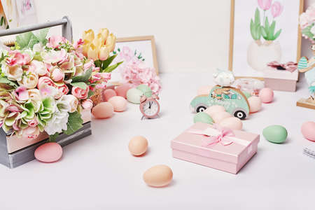 Easter eggs and flowers. Spring greeting card Happy Easter. Easter decor. Watercolor spring...