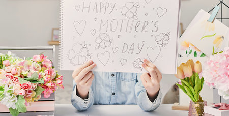Greeting card Mother's Day. Children's drawing postcard. Gift for mom. Child boy draws picture.の写真素材
