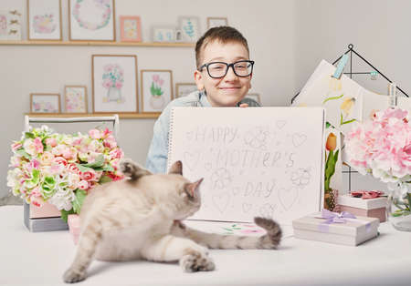Greeting card Mother's Day. Children's drawing postcard. Gift for mom. Child boy draws picture.