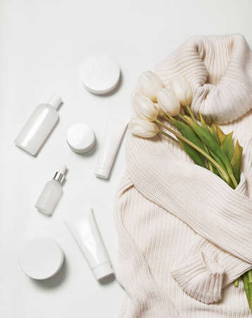 Flat lay flowers and cosmetics. Happy Mother's Day, top view stylish female and spring concept. Blog hero header background. Gift for women. Natural care cosmetics and spa.の写真素材