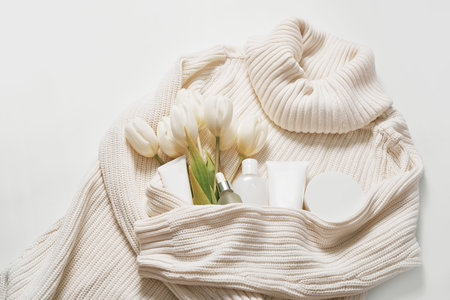 Flat lay flowers and cosmetics. Happy Mother's Day, top view stylish female and spring concept. Blog hero header background. Gift for women. Natural care cosmetics and spa.の写真素材