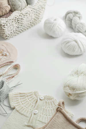 Knitted kids clothes and accessories for knitting. Needlework and knitting. Hobbies and creativity....