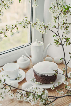 Spring Easter card. Easter cake and eggs. Flowering branches. Celebration and holidays.の写真素材
