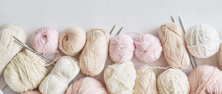 Skeins of yarn, knitting needles, accessories for knitting. handmade, hobby.の写真素材