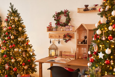 Winter holidays and vacations. Christmas and New Year decor background. Christmas tree and toys. Santa's Residence. Holiday apartment interior.の写真素材