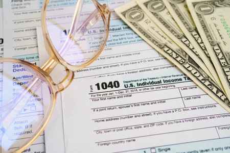 Tax form 1040 U.S. Individual Income Tax Return, business finance concept.の写真素材