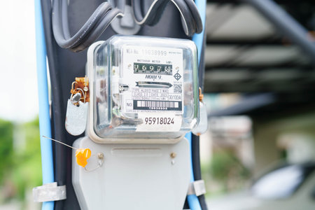 Bangkok, Thailand April 7, 2025 Electric measuring power meter for energy cost at home and office.の写真素材