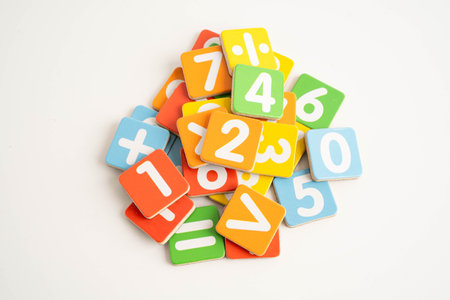 Number wood block cubes for learning Mathematic, education math concept.