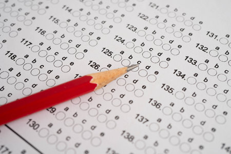 Answer sheets with pencil drawing fill to select choice, education.