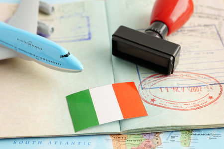 Italy passport with approved stamp on document for tourism to immigration at airport in country.の写真素材