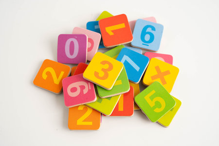 Number wood block cubes for learning Mathematic, education math concept.