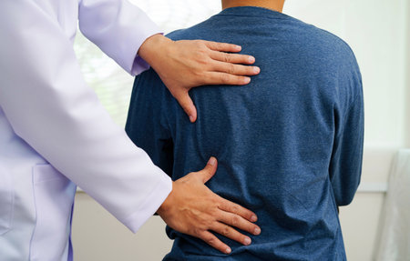 Physical therapy, Asian therapist doctor treat perform pain therapy in hospital.の写真素材