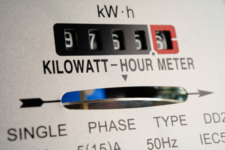 Electric measuring power meter for energy cost at home and office.