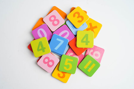 Number wood block cubes for learning Mathematic, education math concept.