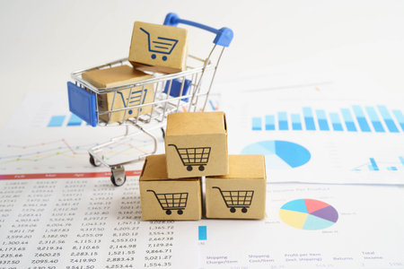 Online shopping, Shopping cart box on business graph, import export, finance commerce.